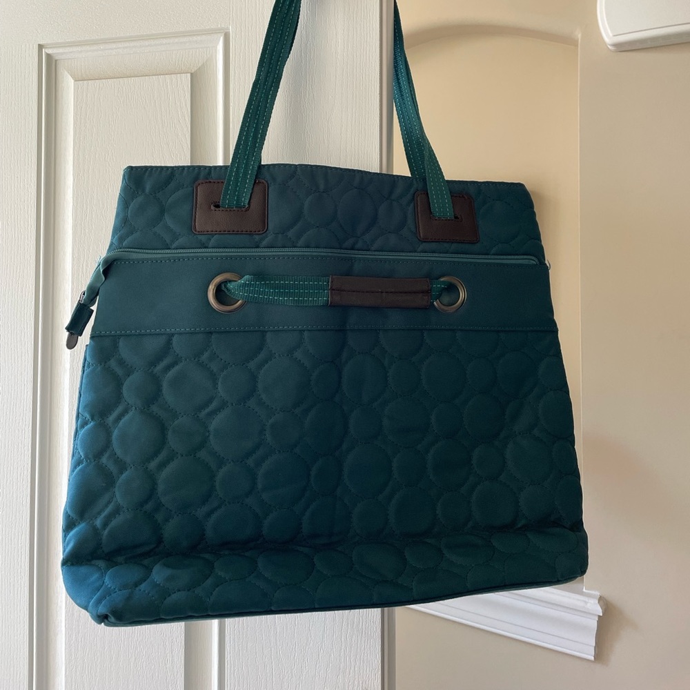 31 Kelly Green bag that is full of surprises.